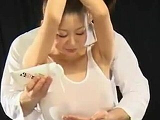 Asian babe gets tickled and teased in HD video