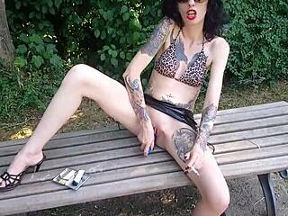 Slutty Lucy ravenblood enjoys smoking and dildoing her pussy in public