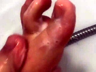 Amateur bathroom footjob and jerk off instructions