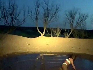 Tranny Staci shows off her mud monster look in high heels