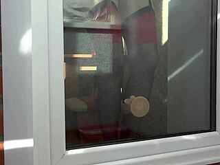 Slim milf masturbates juicy butt in doggystyle outside window with foot fetish in stockings