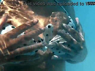 Irina Cage's Busty Underwater Adventures With Intense Public Exposure. Russian Pornstar Dives Deep For Blonde Girlfriend Action.