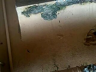 Bathroom hidden cam catches naked beauty