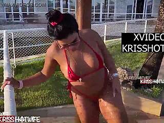kriss hotwife asks, 'want to see my ass in this micro bikini?' in the hotel shower