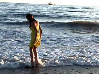 Natural beauty gabby enjoys a relaxing day at the public beach