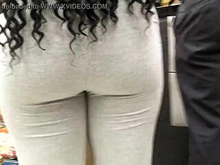 Hey, check that ebony shorty grabbing booze at Baltimore's local store!