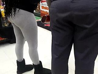 Hey, check that ebony shorty grabbing booze at Baltimore's local store!