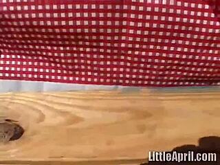 Hey, watch this outdoors teen 18+ April fingering solo in a wild scene!