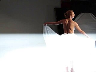 Ballerina Performs Graceful Moves in Public Outdoor Setting