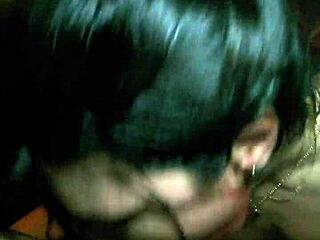 A sexy brunette gives a blowjob in the bathtub