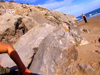 A busty MILF struts on the beach and gets fucked hard in high definition