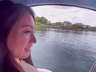 Girl in miniskirt enjoys boat ride at lake 😊