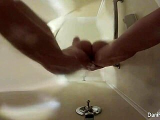 Dani Daniels Showers and Masturbates Her Big Tits in Home Movies!