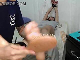 Big tits Latina gets her feet tickled in homemade video
