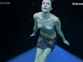 Adriana's provocative stroll underwater