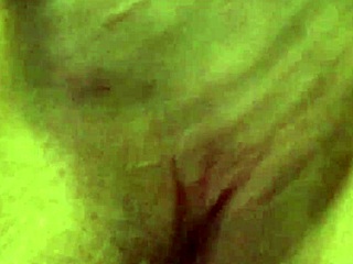 Hidden camera captures a naughty escort indulging in self-pleasure