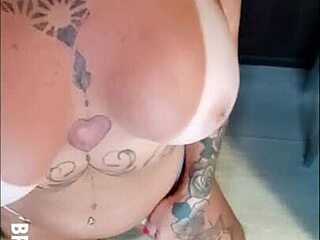 Redhead amateur teases friend with sensual big tits display