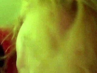 My wife gives an early morning blowjob in our amateur video