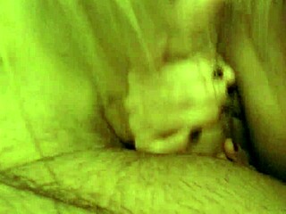 Blonde amateur wife gives a footjob and swallows cum
