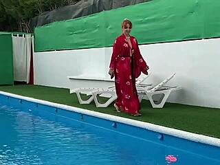 A brunette with big boobs gives a handjob and blowjob by the pool while our friend watches