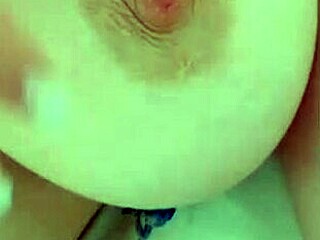 busty beauty teases big nipples while parents sleep