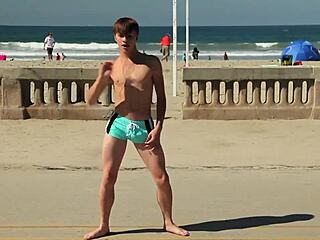 Twink Dancing On The Beach In Speedo