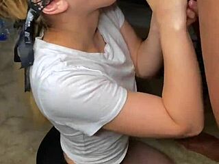 Amateur white girl performs a sloppy blowjob on black cock and receives a mouthful of cum