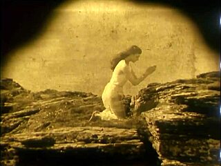 nude woman by waterfall