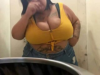 Watch Mary Jhuana flaunt her big, natural tits in the bathroom