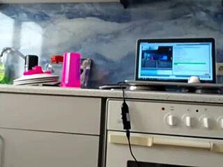 Hot milf shows off big ass in kitchen masturbation