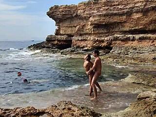 Girls observing us having sex on the beach