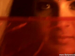 Sexy brunette indian belly dancer teases nude while arousing herself alone in softcore scene