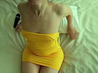 lana in yellow dress plays with herself