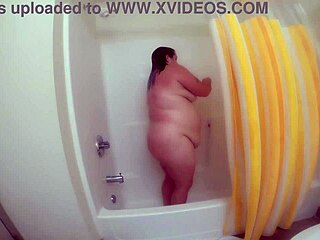 Chubby milf bathes early