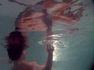 Russian Naked Babe Natalia Strips and Swims in Pool