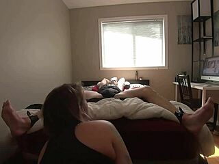 A mature woman playfully stimulates her tied up partner’s sensitive areas. Part 1.