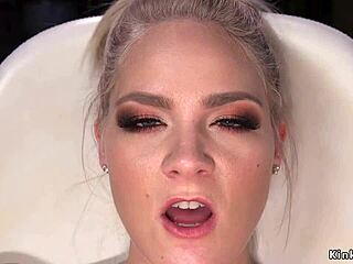 blonde with spread legs using machine for session