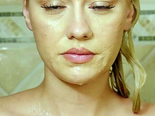 gorgeous blonde model poses under shower in 4k photoshoot