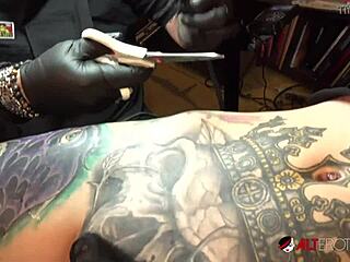 marie bossette touches herself while getting tattooed