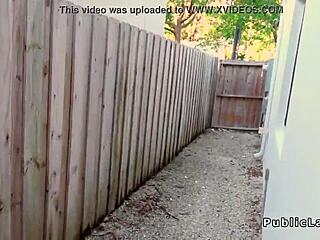 Blonde in torn fishnets seduces group outdoors