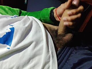 A young guy with a large penis ejaculates in several streams.