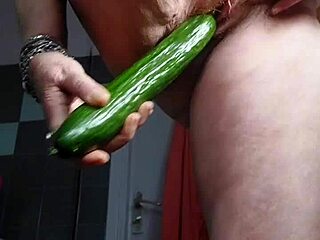 Granny Pounds Hairy Pussy with Cucumber
