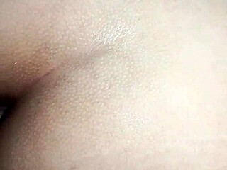 In this homemade scene, a sexy amateur gets wet