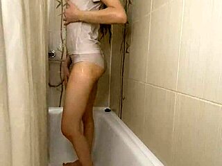 Amateur couple enjoys shower and undress in white underclothes.