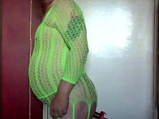 A shy crossdresser gets banged in a gangbang while using a dildo machine.