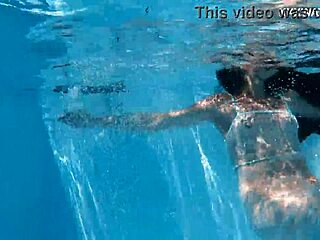 Small booby teen Lana strips and swims naked for you