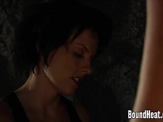 Hey, watch these busty lesbian slaves get whipped in the garage, wanna see?