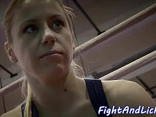 wrestling lesbians kiss passionately in the ring