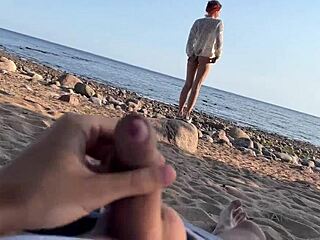 Teacher meets student on public beach.