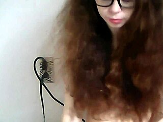 The petite teen amateur goes topless on webcam, exposing her pussy in public taboo show